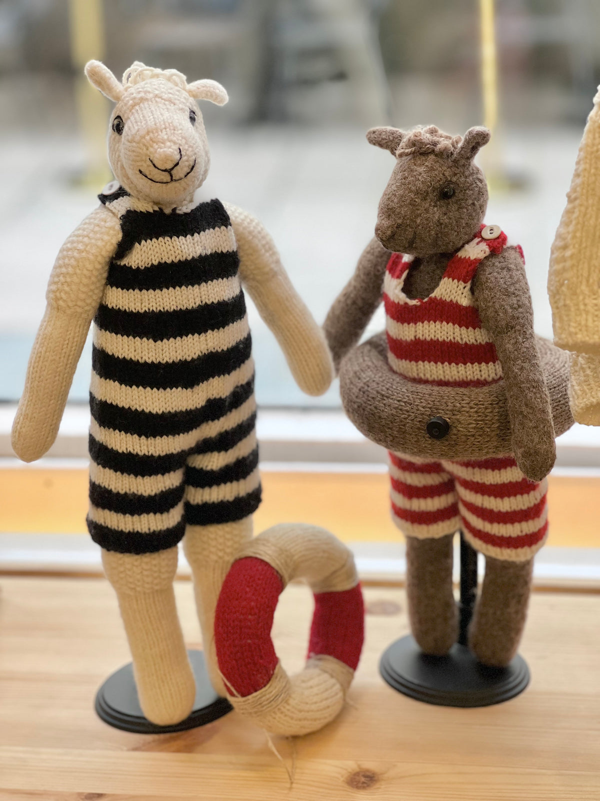 Knitted sheep with swimsuits